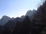 Huge Huangshan Yellow Mountain Range on Light Blue Sky Background at China in Panoramic View.