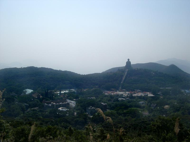 Panorama Natural View in Hong Kong with Famous Vintage Big Buddha Structure on Hill Top.