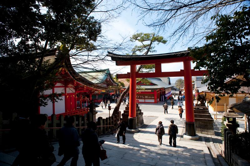 Red entrance torii gate to the Fushimi Inari Shrine, Kyoto, Japan