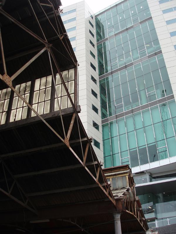 Looking Up at Abandoned Railway Shed and Modern Highrise Building, Melbourne, Australia