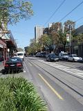 Cars at Famous Fitzroy Street in Melbourne with no Traffic During Morning Time.
