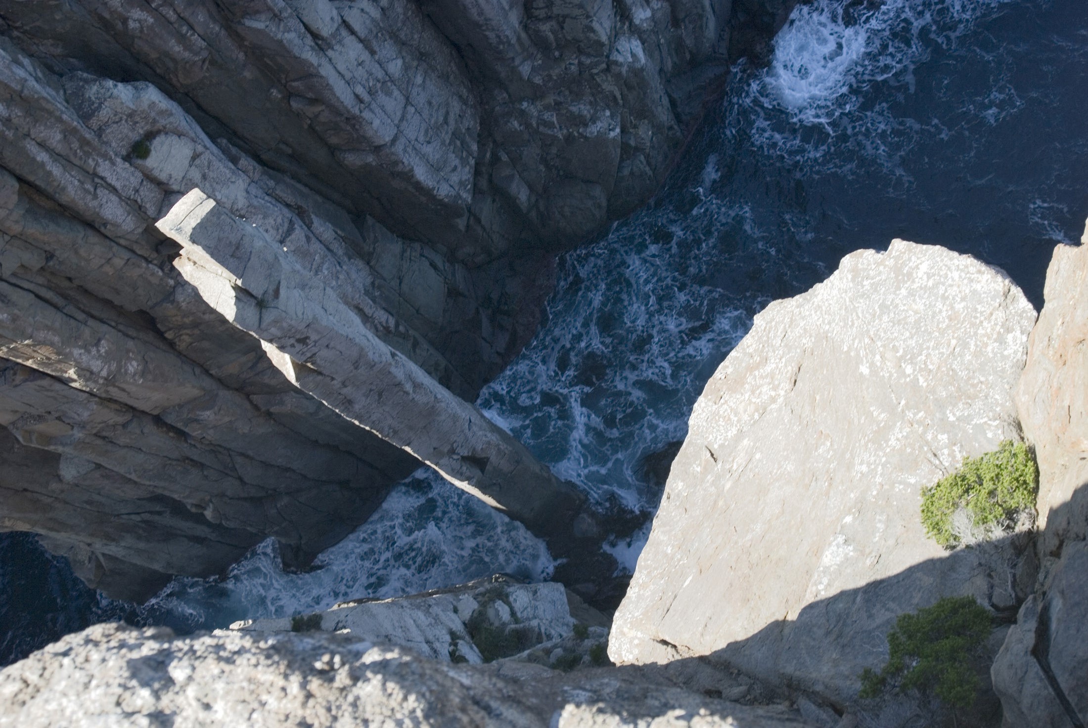 an image of looking down on the slender column of rock known ad the totem pole, cape hauy, tasmania