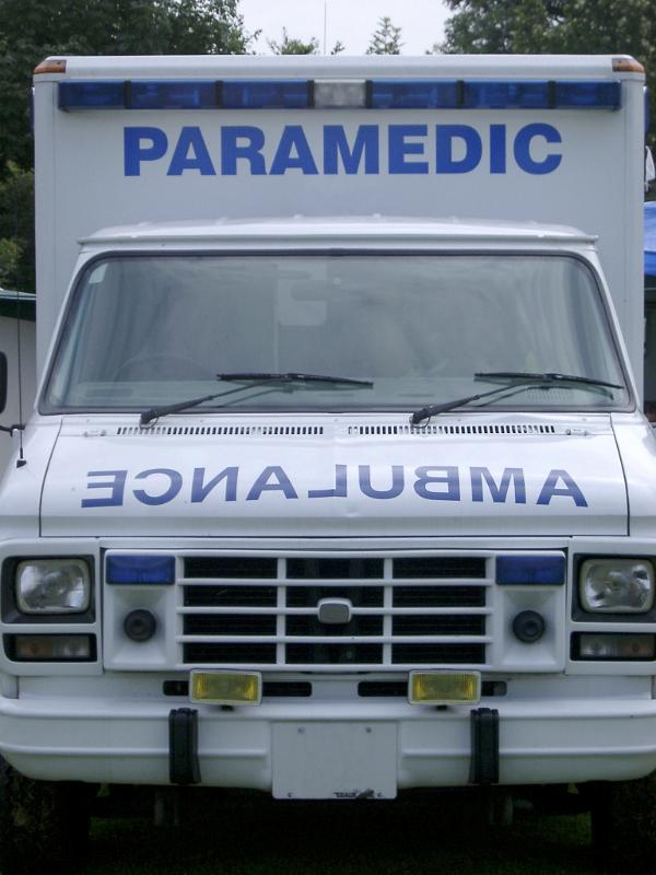 Front view of an ambulance Front close up view of an ambulance with the signage - Ambulance and Paramedic