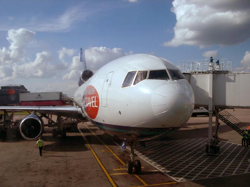 Internal flight Internal flight with a small jet aircraft standing on the apron at the airport