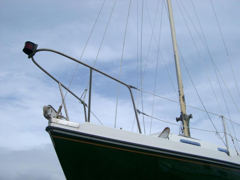 Low Angle View of Forecastle Bow of Yacht Low Angle View of Forecastle Bow of Yacht Against Cloudy Sky