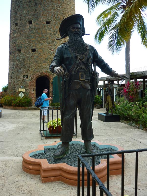 a statue of pirate blackbeard and his castle tower to the rear, St. Thomas, US virgin islands