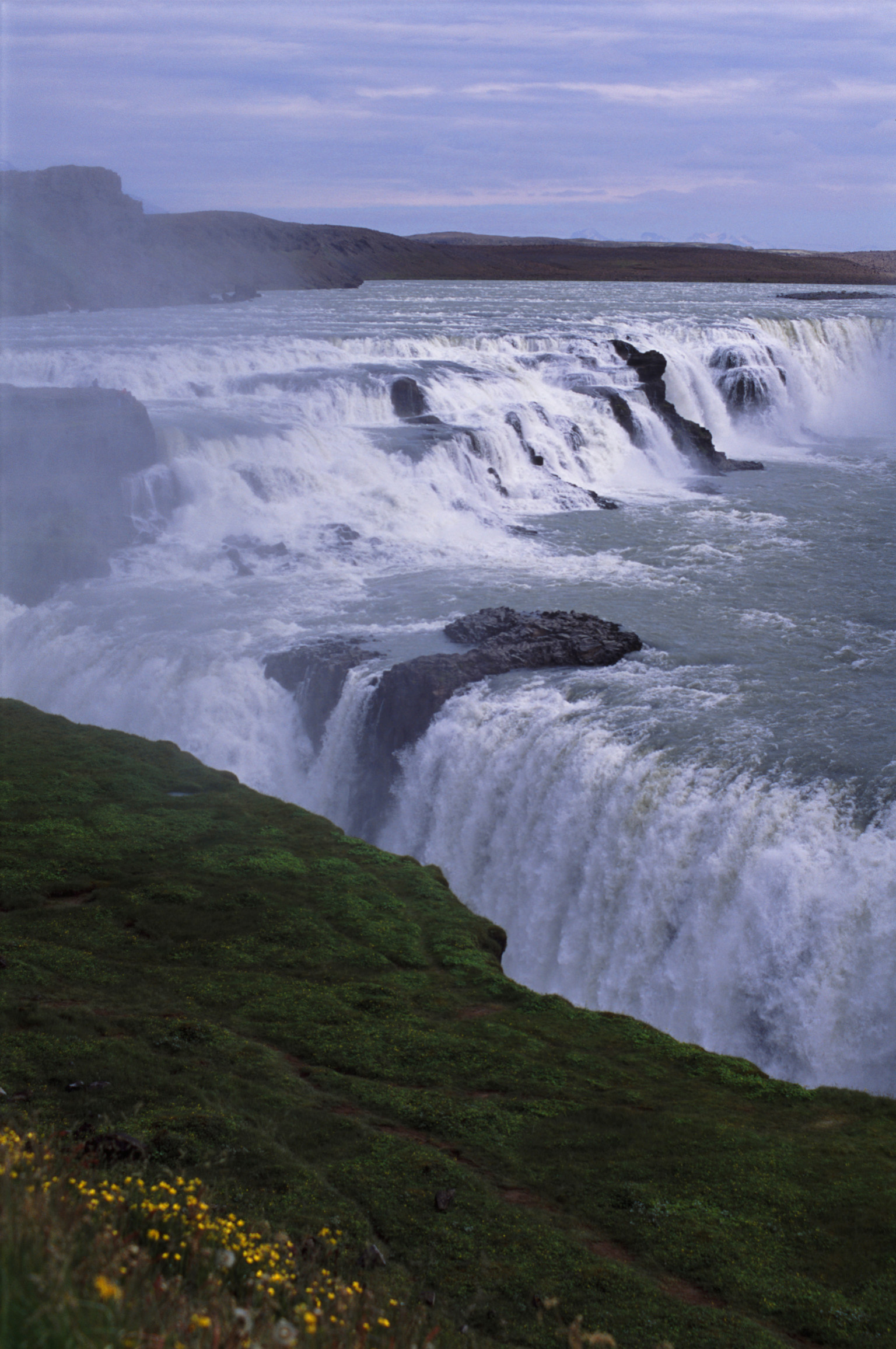 an image of Overview of Rushing Water of Hvita River over Gullfoss Falls in Iceland