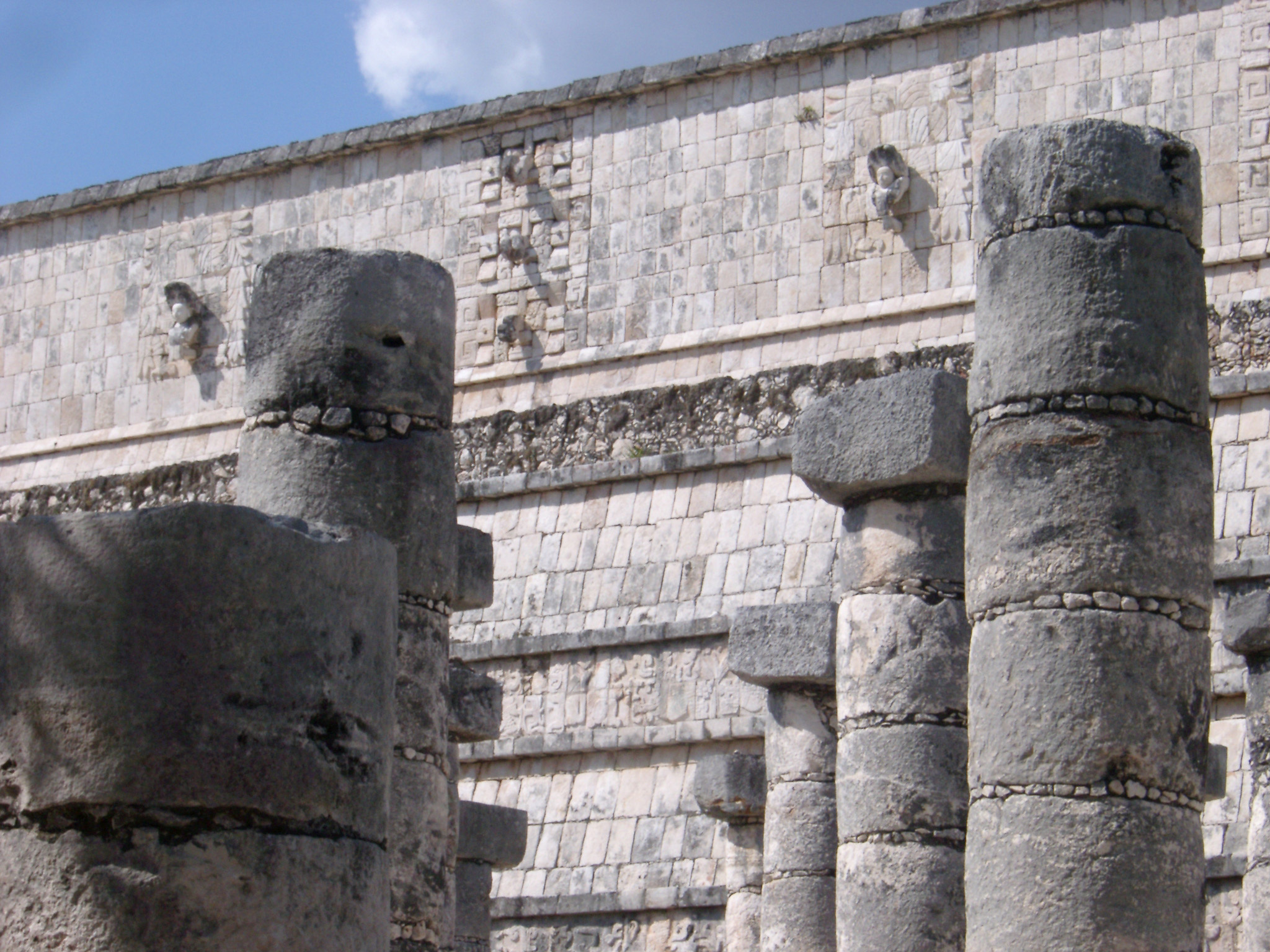 an image of Stone columns in the Mayan ruins of Chitzen Itza on the Yucatan Peninsula, Mexico, a popular tourist destination