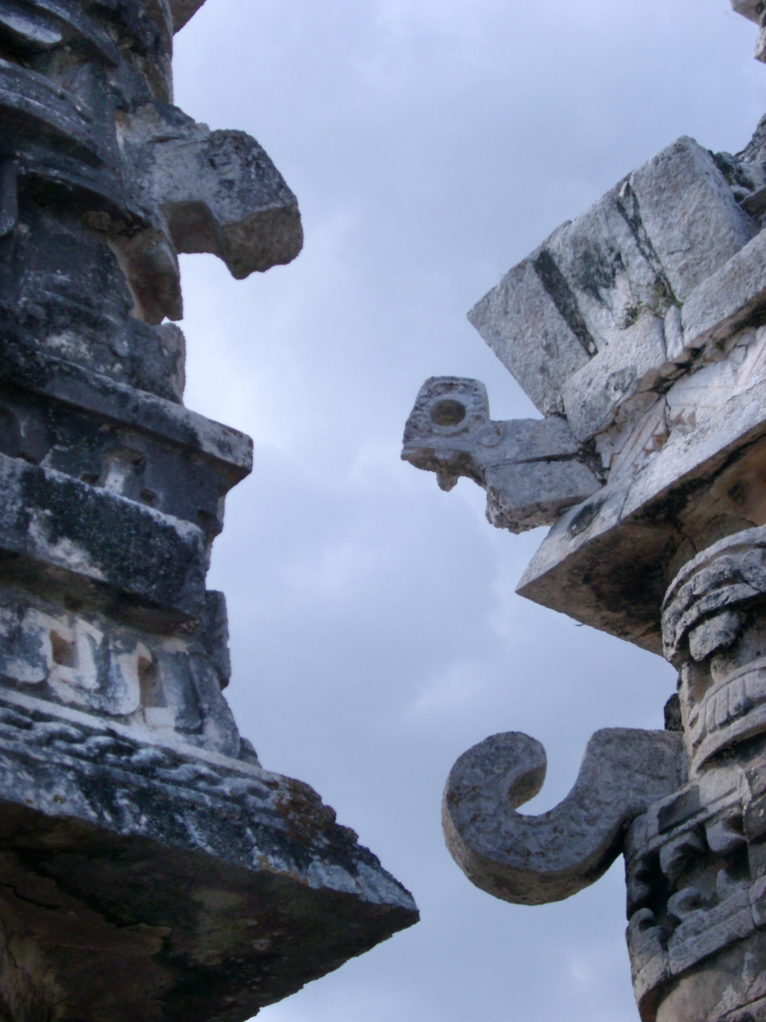 an image of Carvings on the Mayan buildings at Chitzen Itza, an important archaeological site in the Yucatan Peninsula in Mexico featuring Mayan ruins