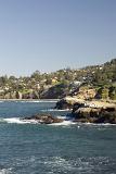 Picturesque view of the seafront and rocky coastline with the town of La Jolla, San Diego