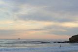 Sunset at Beautiful Refugio Beach in Extensive View. Isolated on Lighter Gray and Orange Sky Background. This Place is Perfect for Vacation.