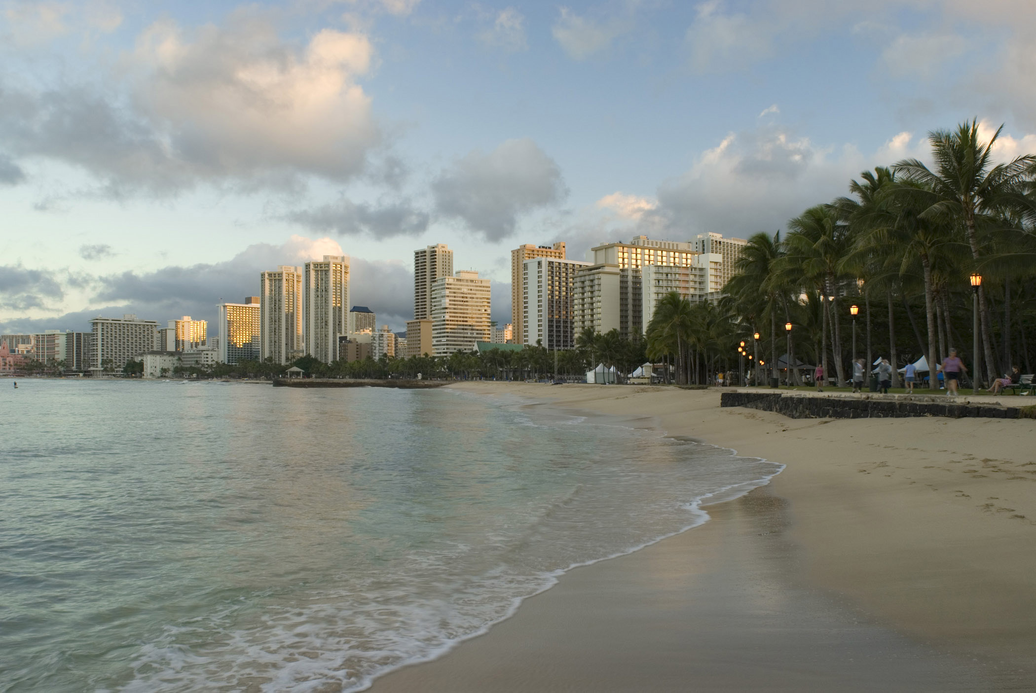 an image of Scenic view of Waikiki waterfront and beach on Oahu Island, Hawaii, USA, a popular tropical tourist destination and surfers paradise