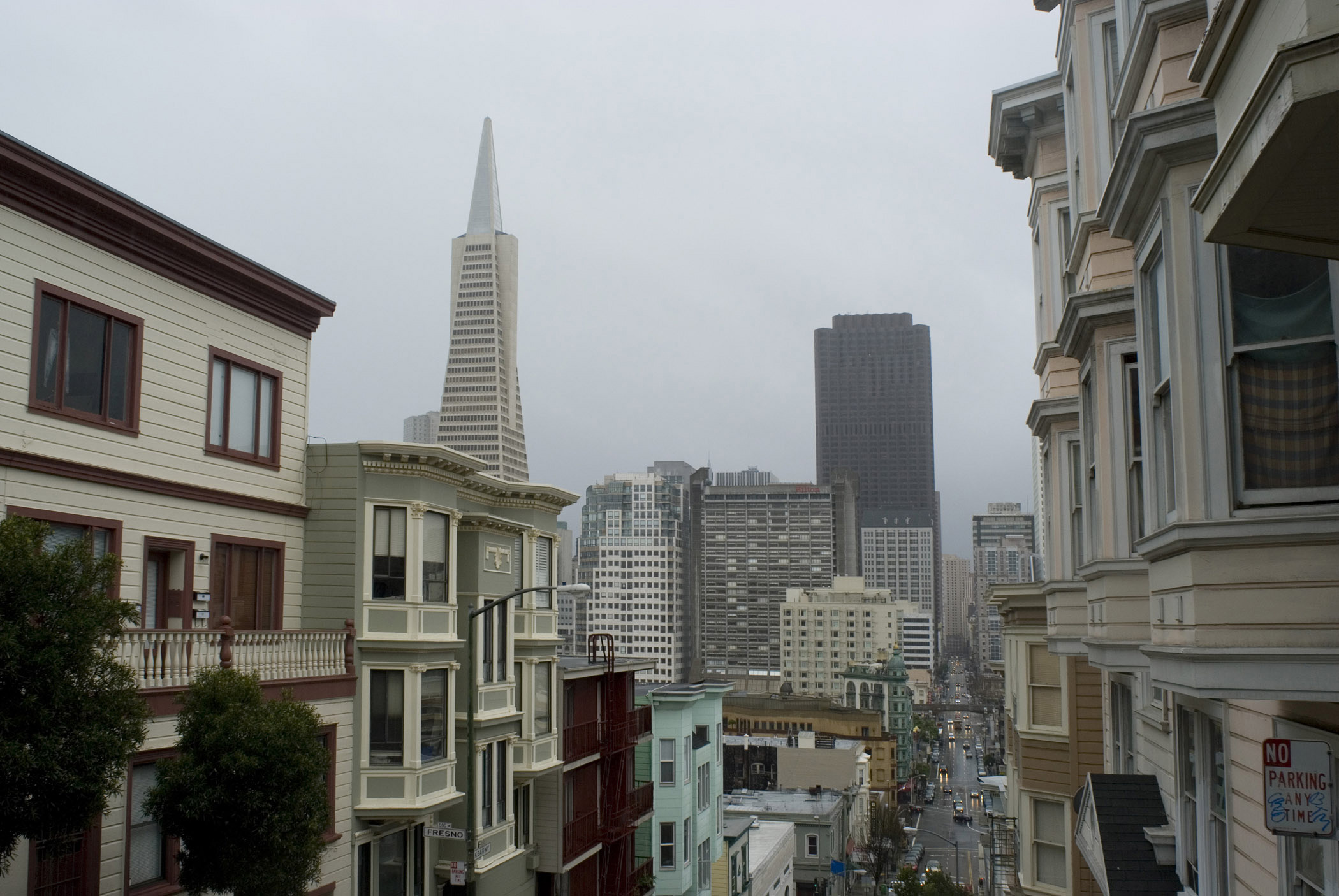 an image of Rainy day in San Francisco looking down a city street towards the CBD and tower