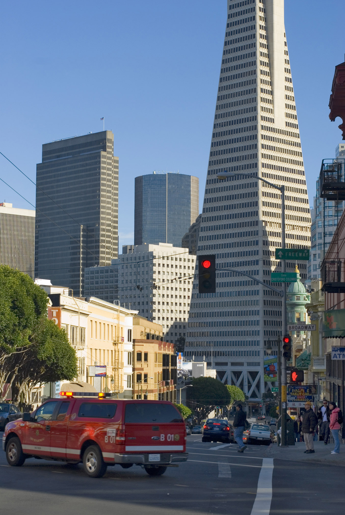 an image of Architectural City Buildings Along the Street at Columbus Avenue San Francisco. Emphasizing Transamerica Pyramid.