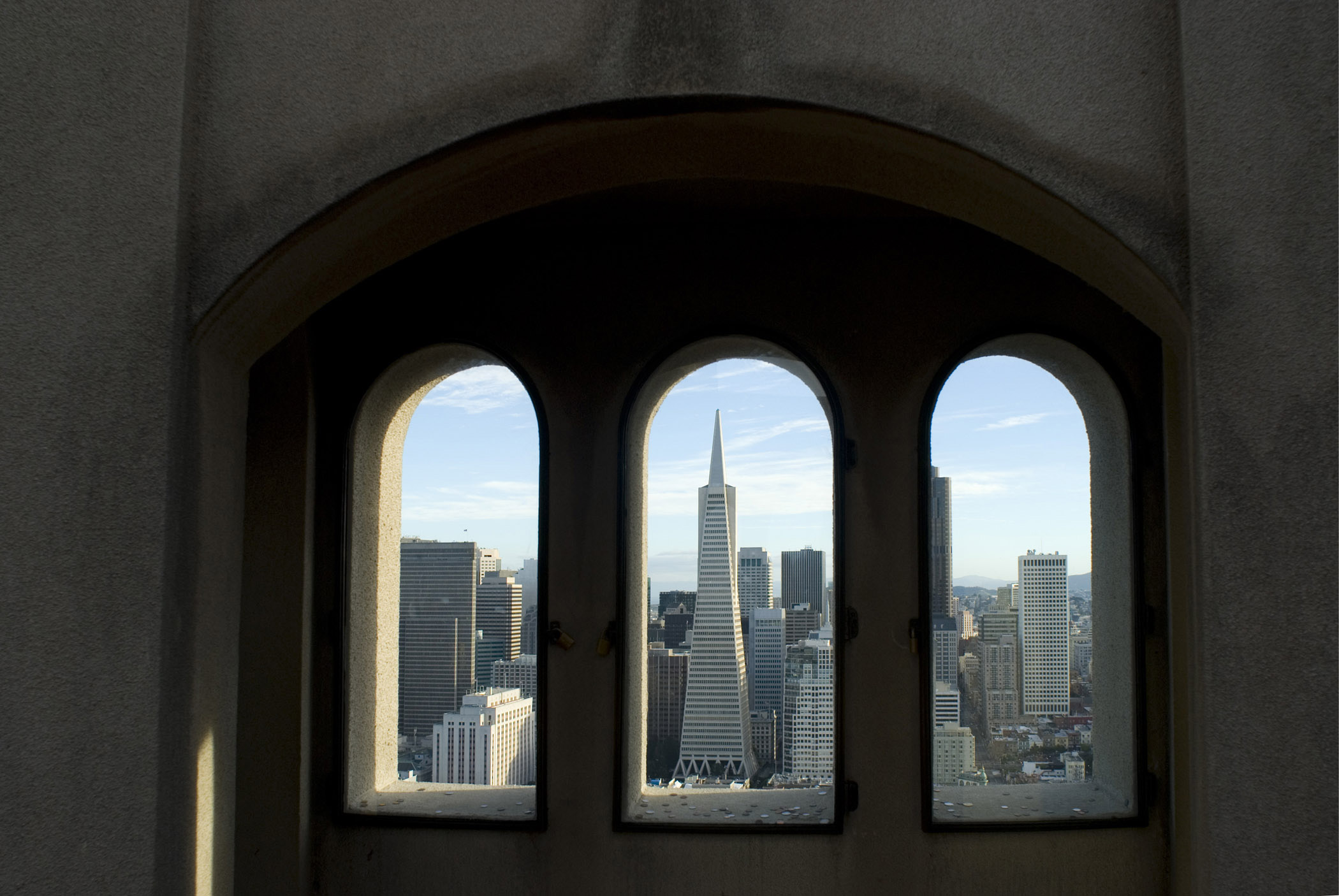 an image of View through the arched Coit Tower windows of the CBD in San Francisco, California
