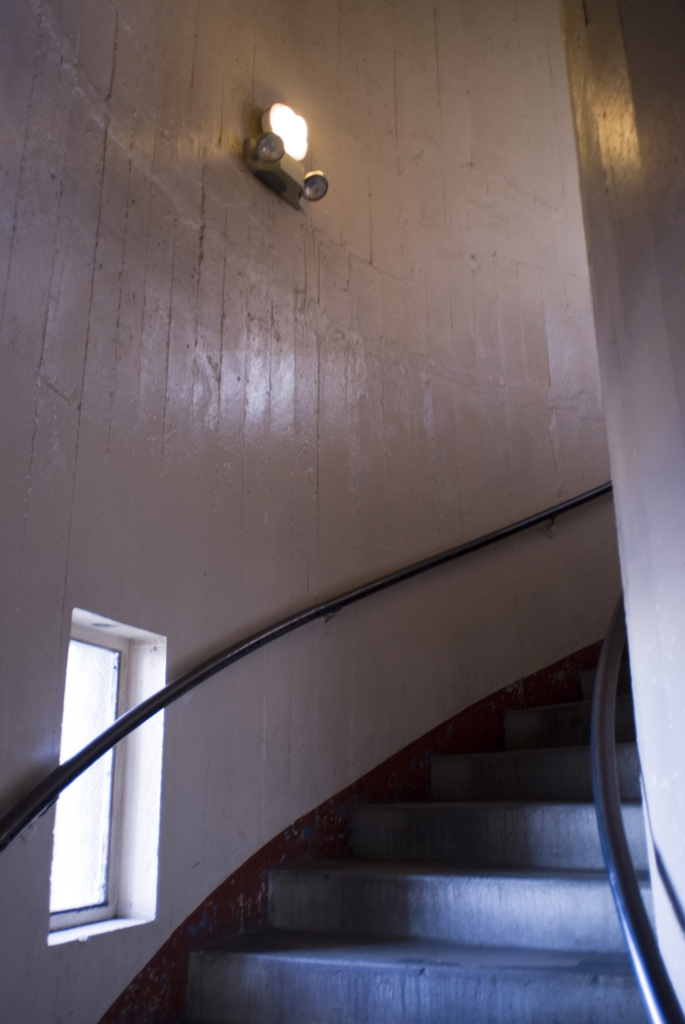 an image of Indoor Vintage Stairs at Famous Coit Tower, also known as Lillian Coit Memorial Tower, in San Francisco