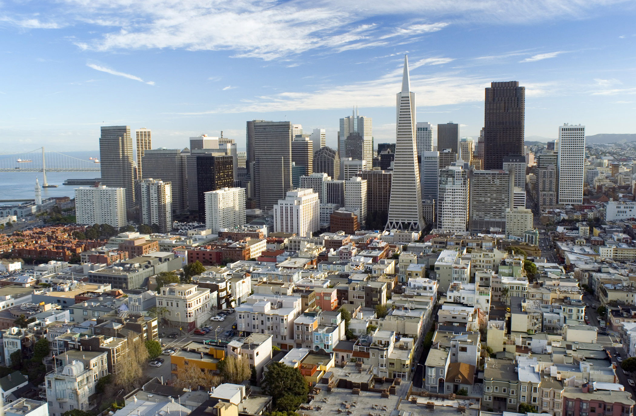 an image of Downtown San Francisco looking across the rooftops to the modern architecture and skyscrapers of the central CBD on the skyline