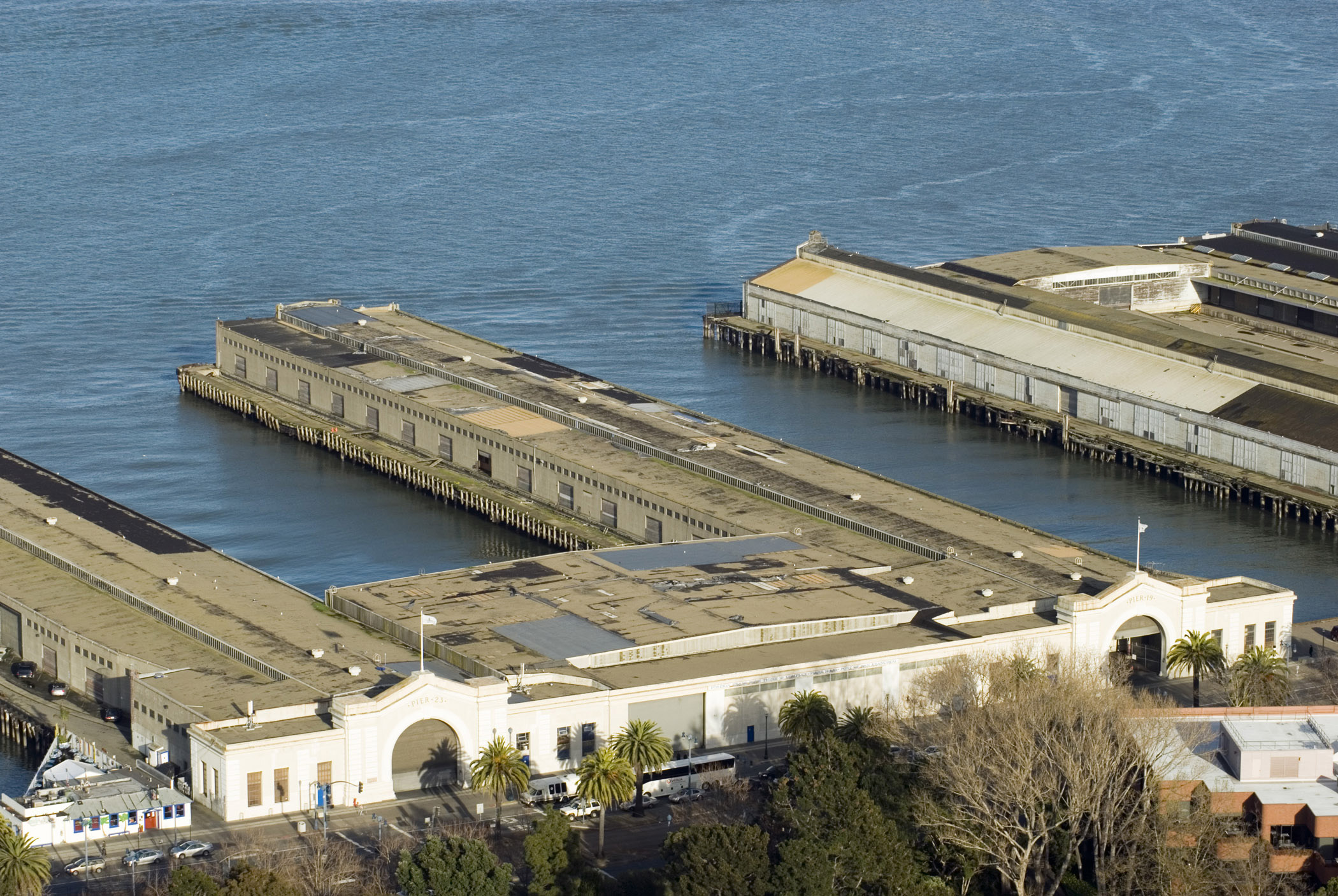 an image of Aerial view of the do historical decommissioned San Francisco Piers and warehouses at the docks