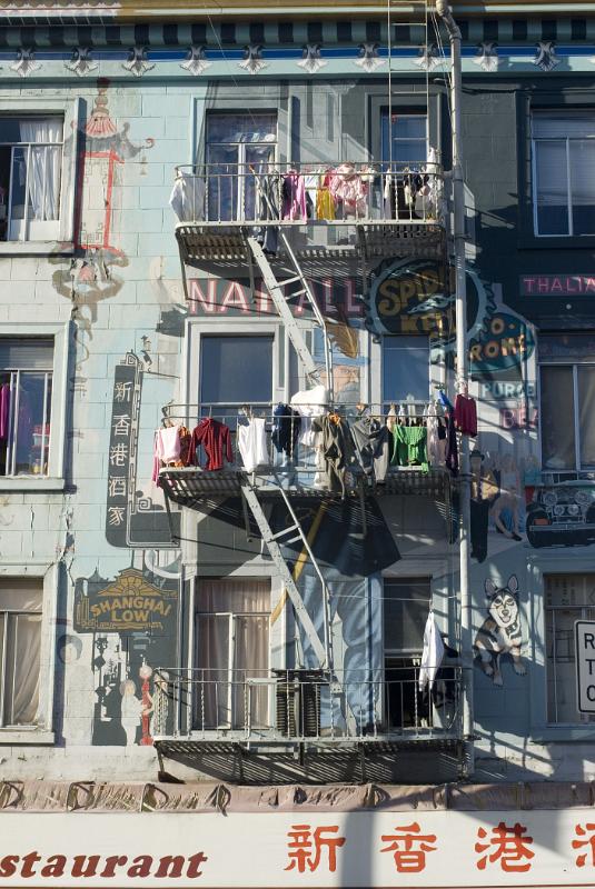 Clothes hanging out to dry over the balconies at a Chinese washhouse at a North beach laundry, San Francisco