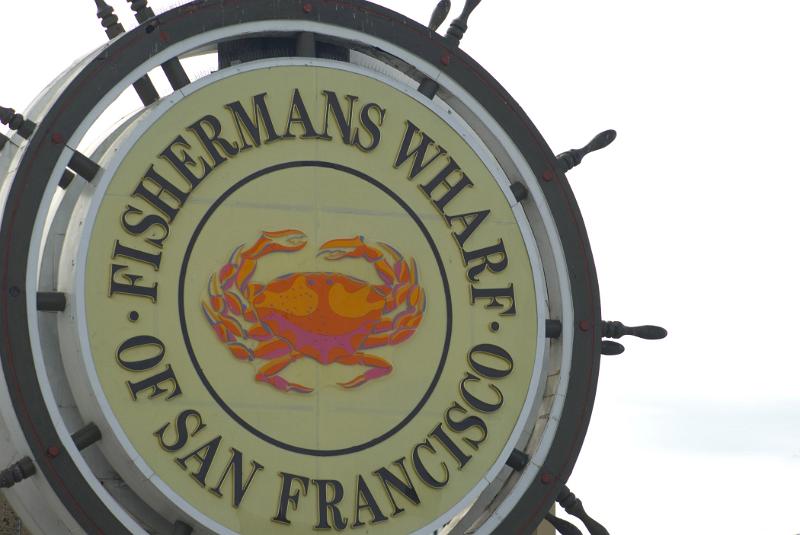 Close up Big Fishermans Wharf Signage of San Francisco on White Sky Background.