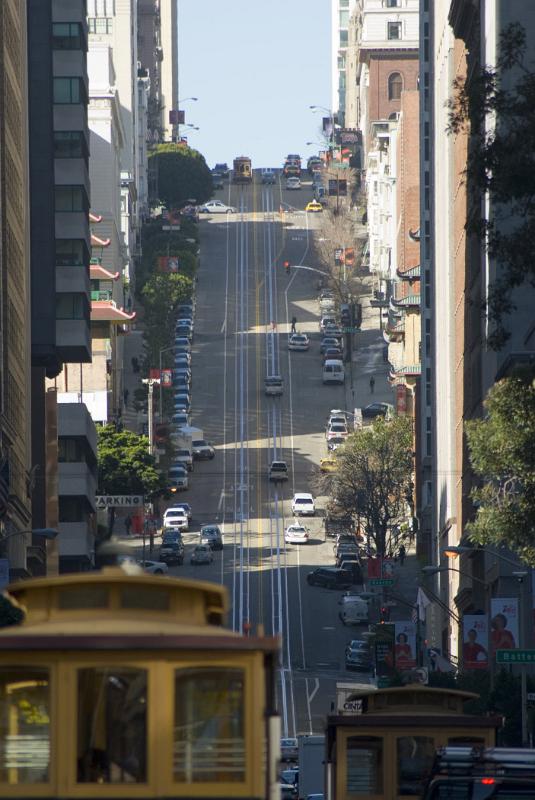Scenic view with a tram in the foreground of Nob Hill, San francisco, California, a fashionable neighbourhood and one of the original seven hills of the city
