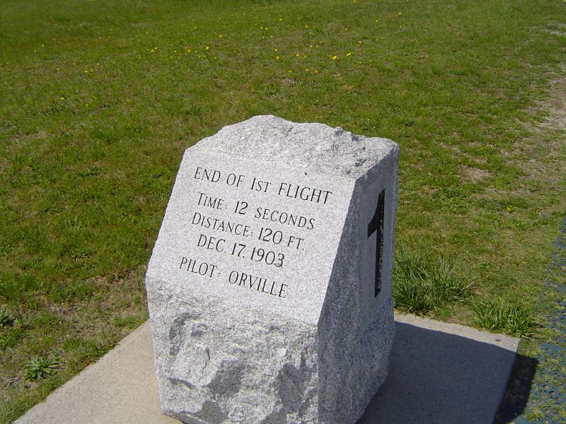 Close up Stone Structure at Kitty Hawk Memorials on Grassy Land.